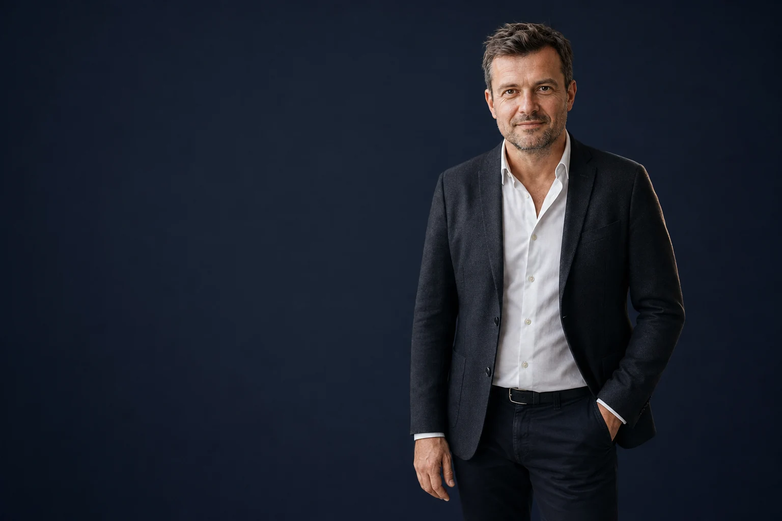 Illustrative portrait of Martin Vacek in a dark jacket against a studio background